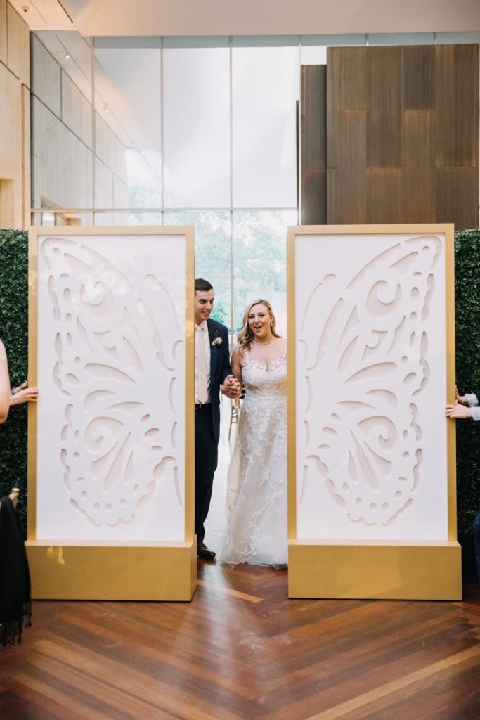 Boho Garden Summer Wedding custom butterfly room divider Unique Bridal Party Entrance by Sebesta Design at the Barnes Foundation. Photography by Love Me Do Photography