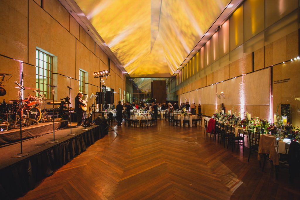 Modern Organic Museum Wedding Reception with textured ceiling lighting wash at the Barnes Foundation by Sebesta Design. Photography by Max Grudzinski Photography 
