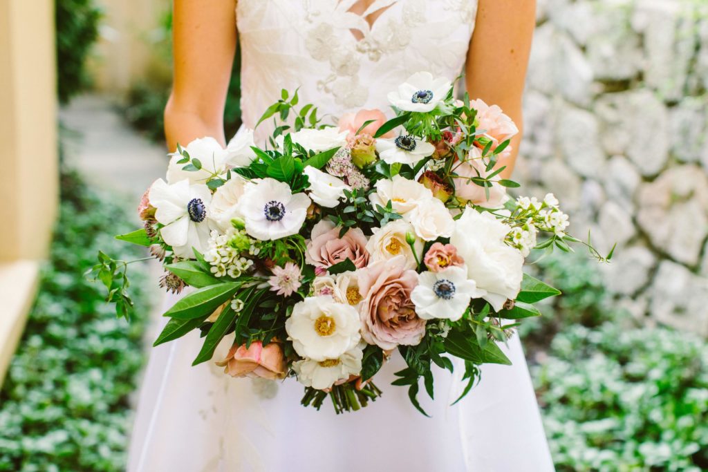 Elegant, Ethereal and Autumnal Wedding Bridal Bouquet of taupe garden roses, white cabbage roses, white anemones, white majolica spray roses, lisianthus, garden greenery and jasmine vine Designed by Sebesta Design, Photography by Redfield Photography