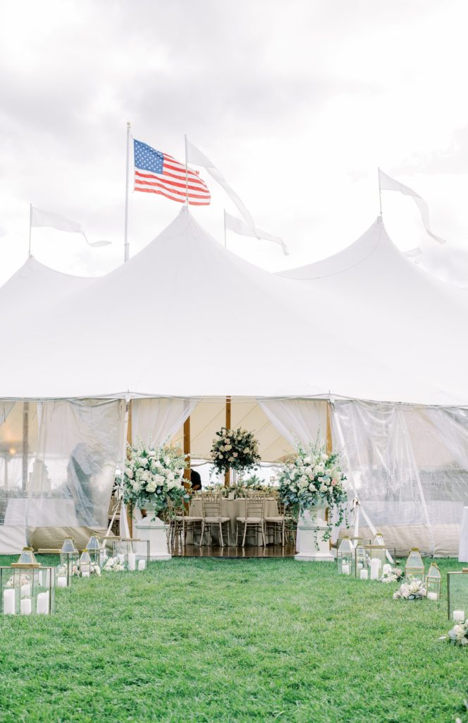  Classic Timeless Garden Party Cape May Congress Hall Wedding. Sailcloth tent covered lawn reception with entrance flanked by lush overflowing garden urns. Lantern-lined garden path. Event design by Sebesta design, photography by Rachel Pearlman Photography