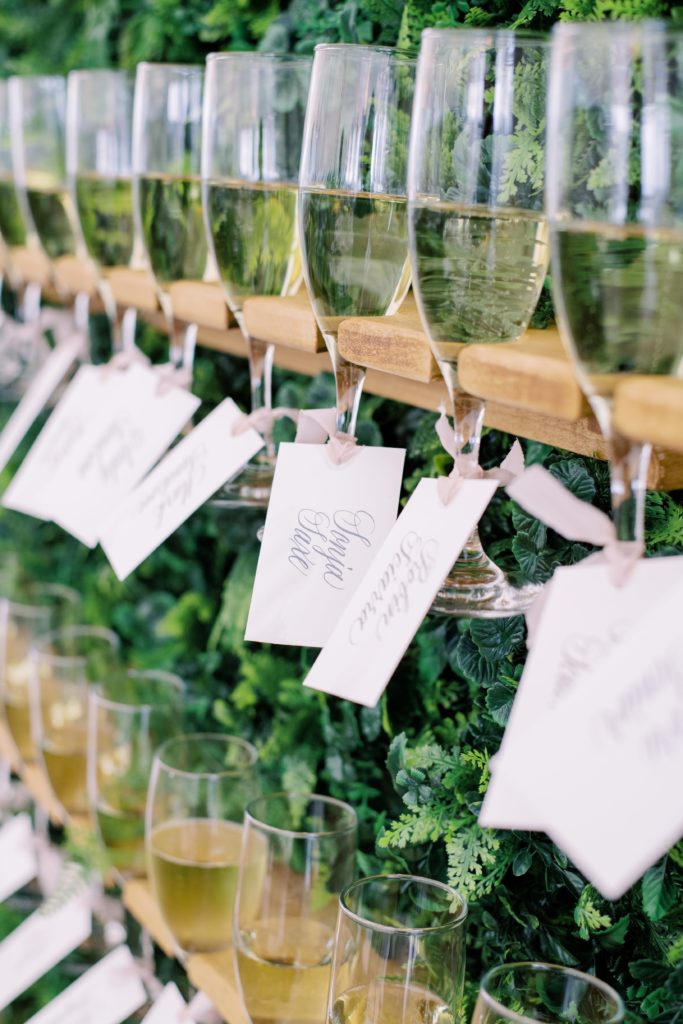 Classic Timeless Garden Party Wedding Reception, Custom greenery covered champagne escort card display at Congress Hall in Cape May, NJ. Event design by Sebesta design, photography by Rachel Pearlman Photography